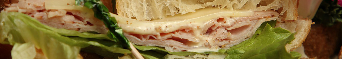 Eating Fast Food Sandwich at Sol Karibe Restaurant & Bar restaurant in Springfield, MA.